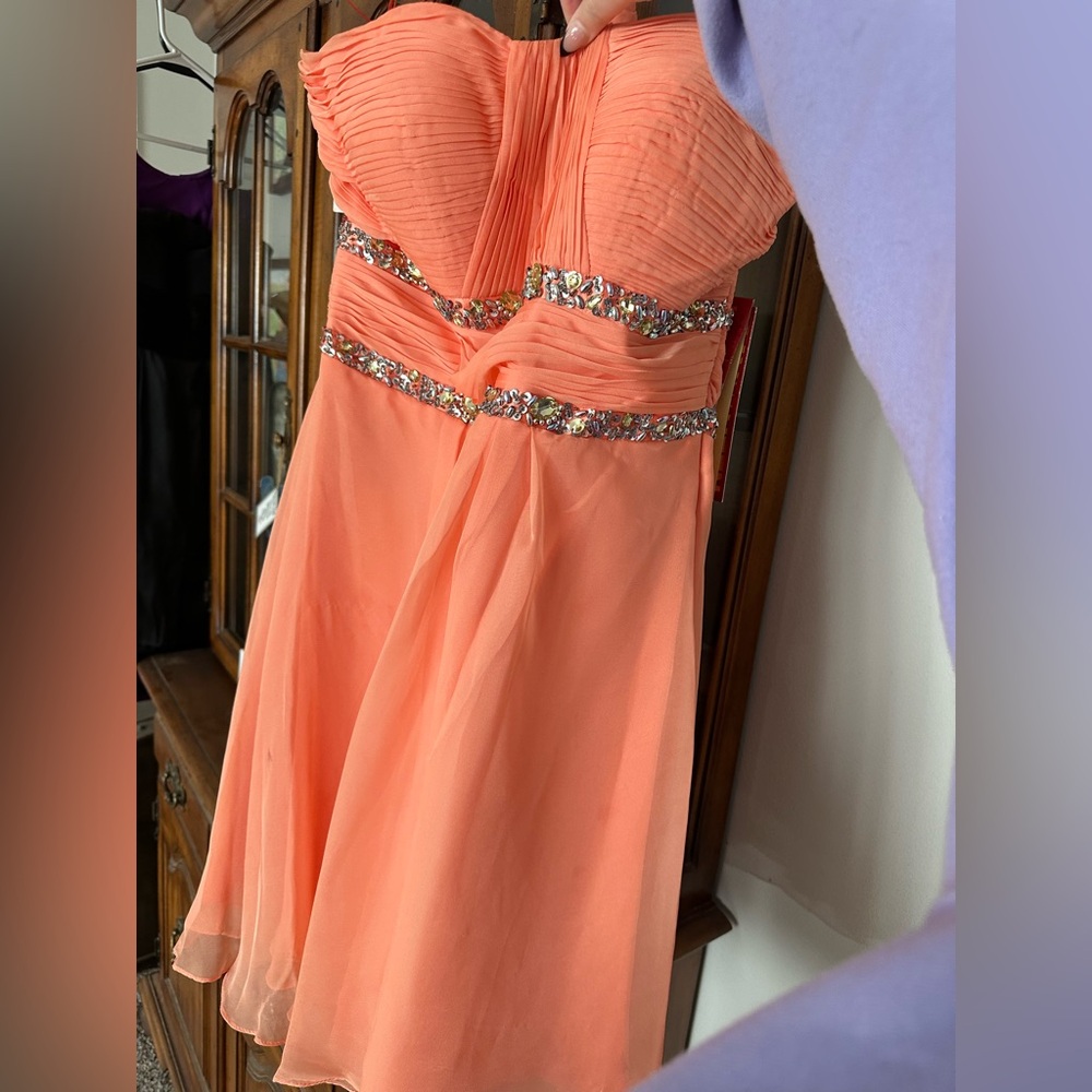 Orange strapless Homecoming dress